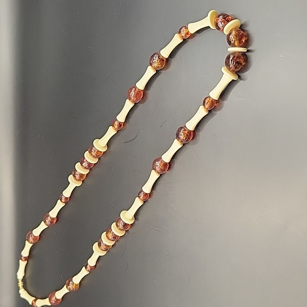 Amber color and ivory color necklace 31" long vtg